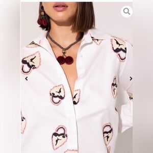 Stylish White Blouse with Artistic Pattern